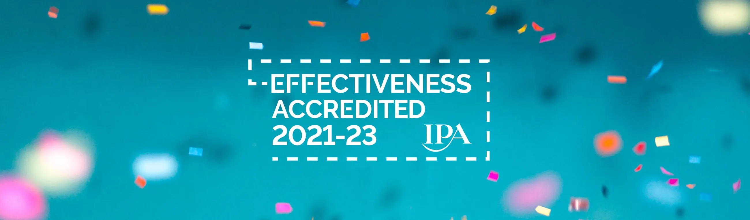 Blue background with confetti falling and a white badge in the centre reading 'Effectiveness Accredited 2021-23' from the IPA
