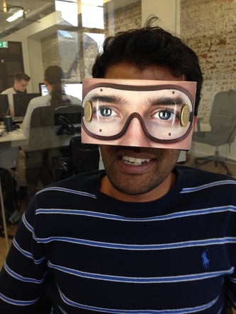Sanj checks out a pair of augmented reality goggles.